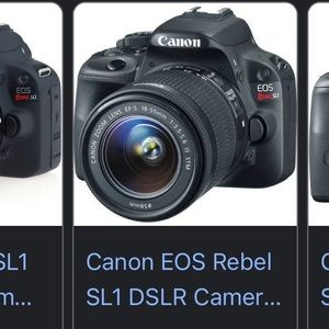 Canon Camera, barley used comes with extra lenses, bag, battery, and charger.